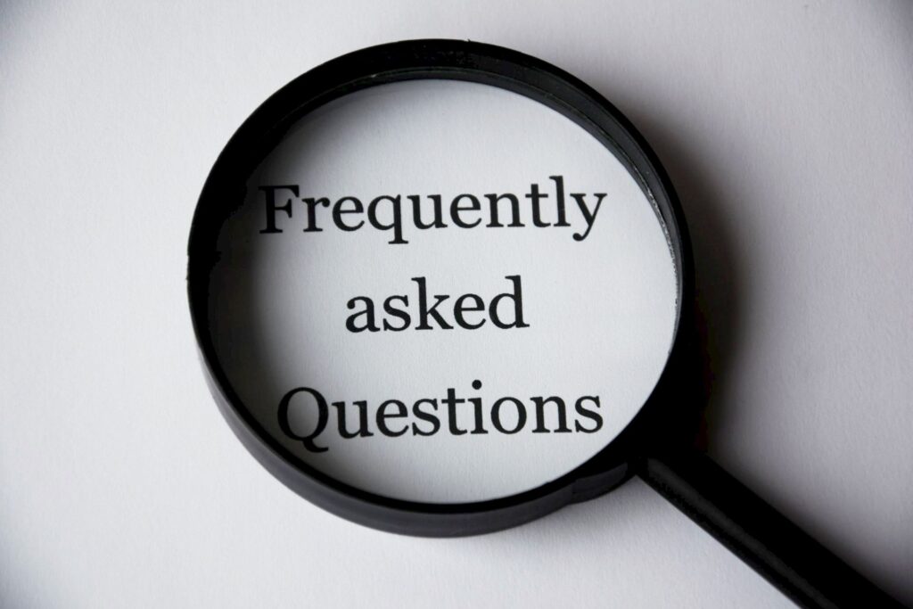 Magnifying glass symbolizing hard vs. soft credit inquiries on a credit report