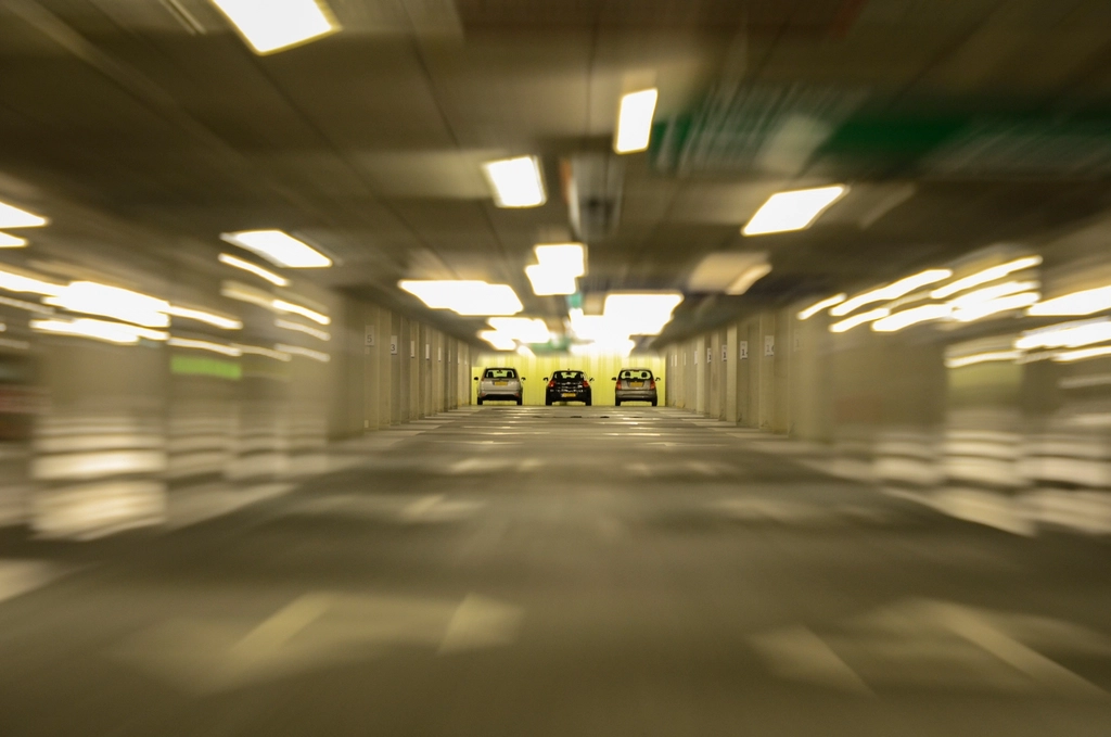 Parked cars, illustrating leasing vs. buying a car